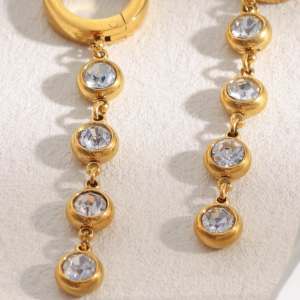 The Calliope Zircon Tassel Huggie Earrings by Vexa - Earring - Vexa