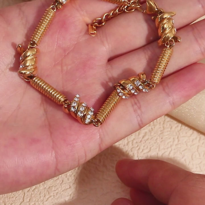 The Radiance Spring Knot Zirconia Bracelet by Vexa