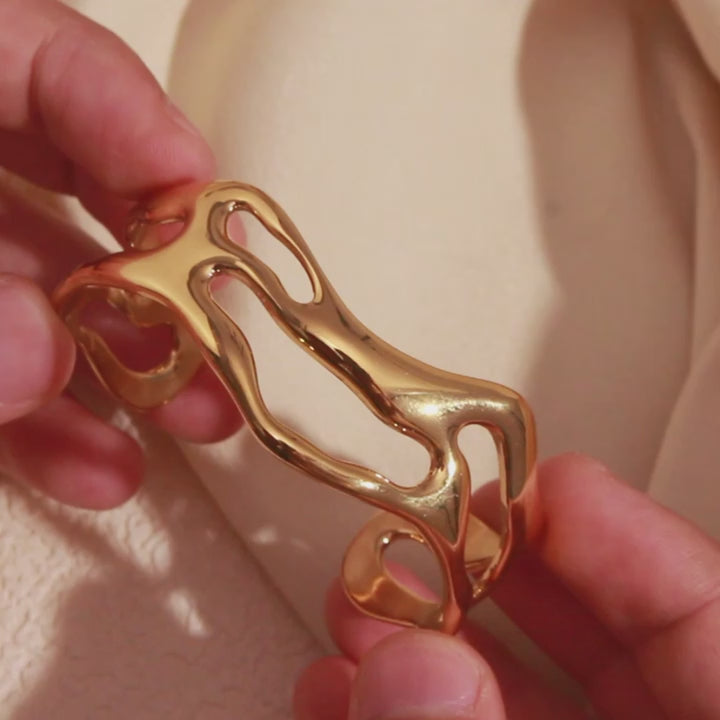 The Rhythmic Wave Hollow Cuff by Vexa